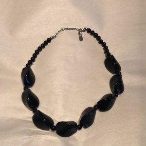 Necklace with large black beads/stones